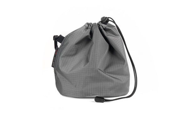 A Medium, clear-bottomed Yarn Stuff Sack in Mountain Grey (grey with light grey grid) 210 Cerylon.